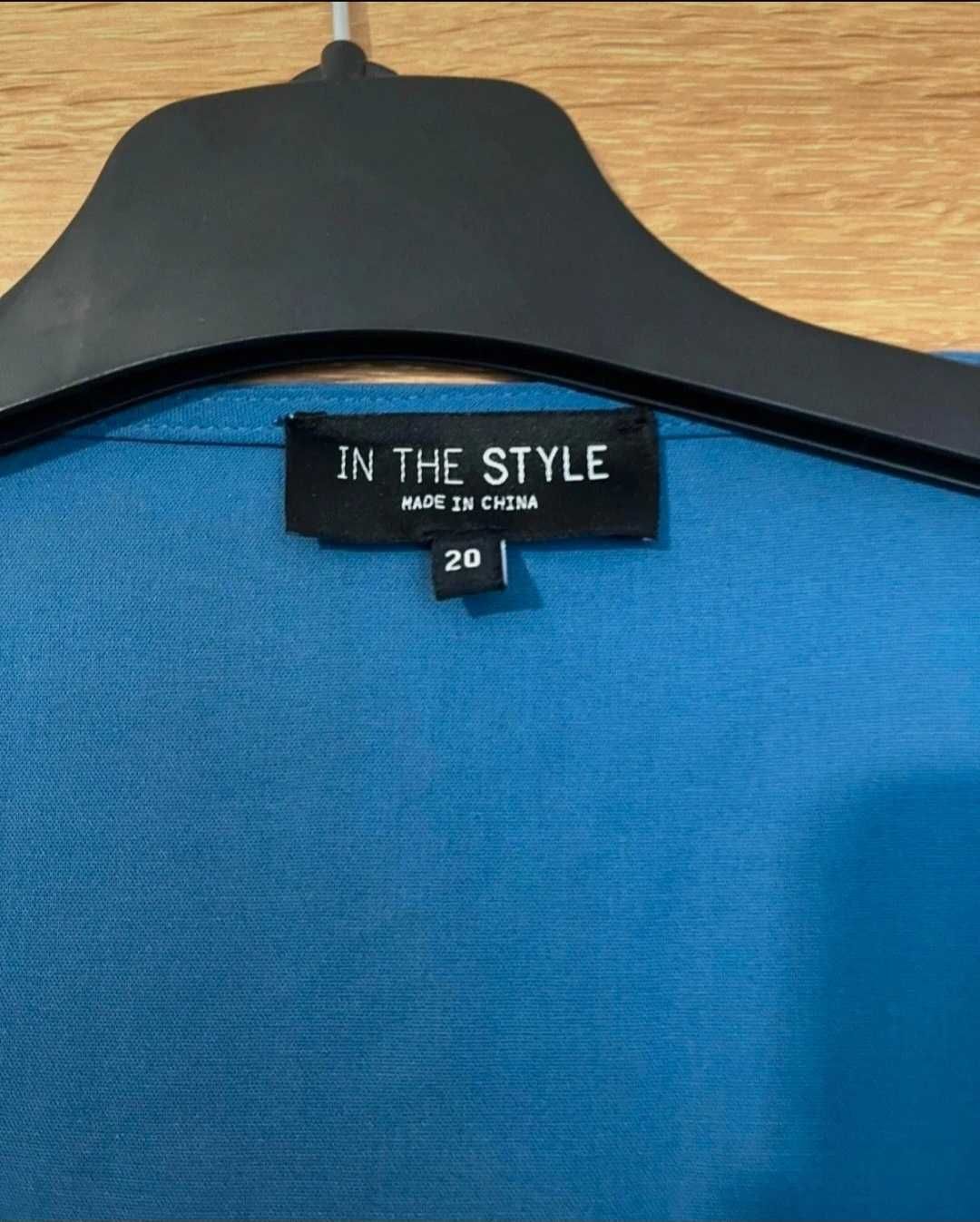 In The style niebieska bluzka z węzłem 48