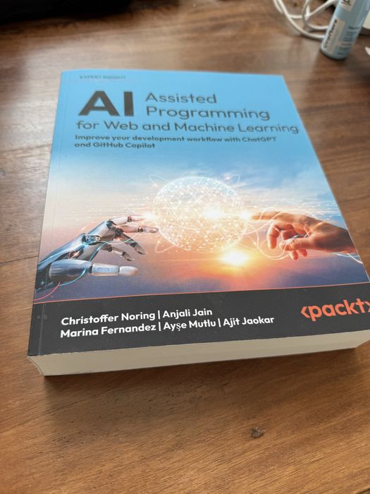 AI-Assisted Programming for Web and Machine Learning - packt papierowa