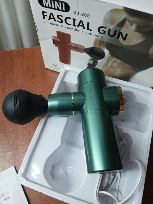 Масажер пістолет,  вібромасажер