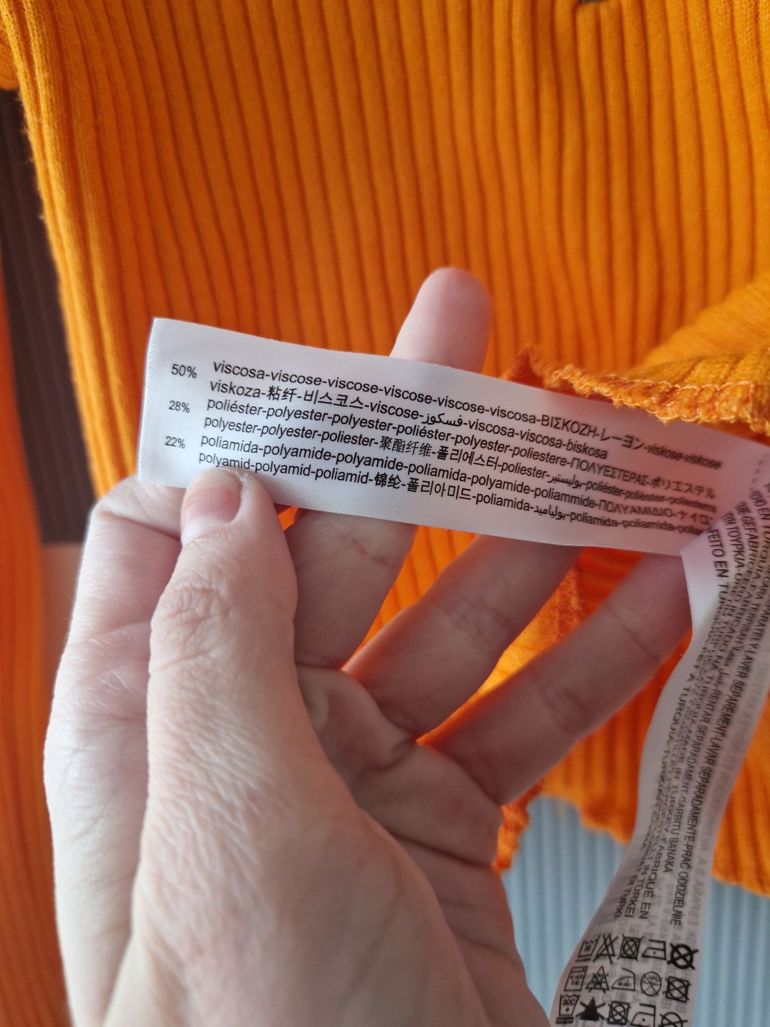 Obcisła bluzka na długi rękaw, prążkowana, pomarańczowa z zamkiem, pół