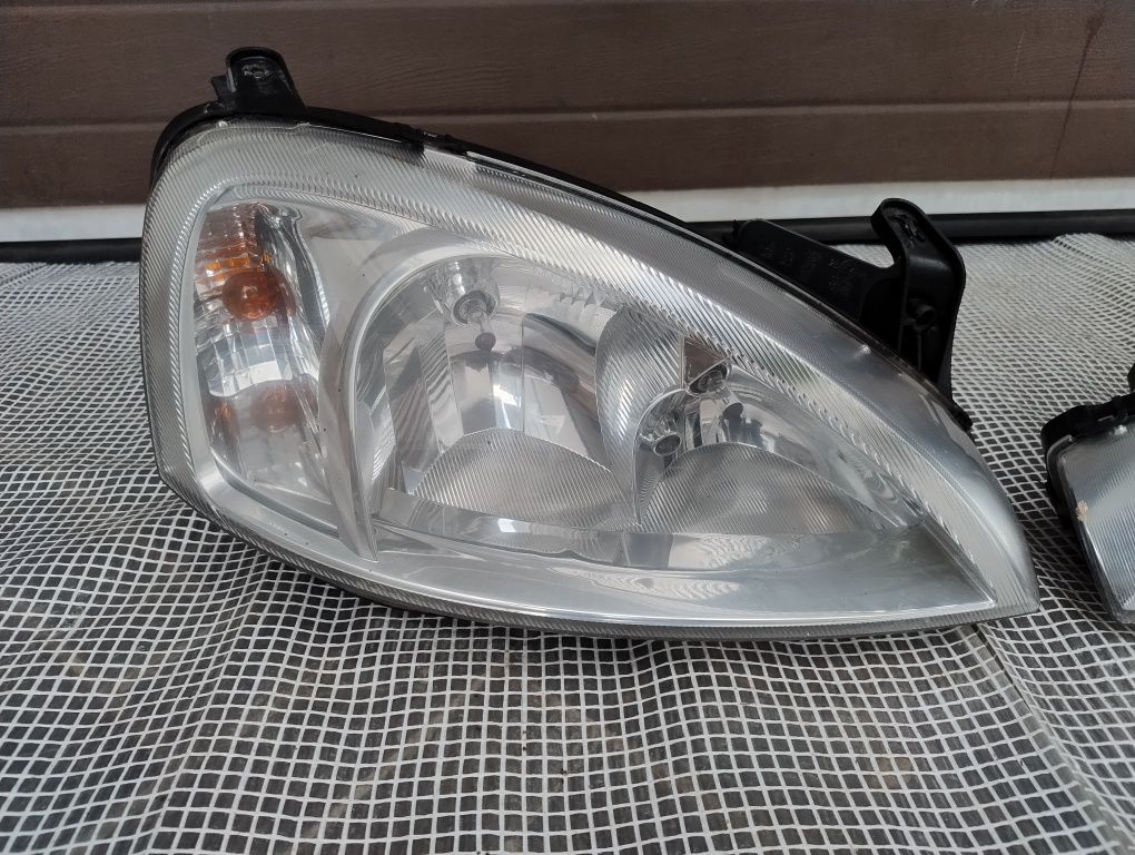 Opel Corsa c lift Europa lampa reflektor prawy lewy komplet DJ auto