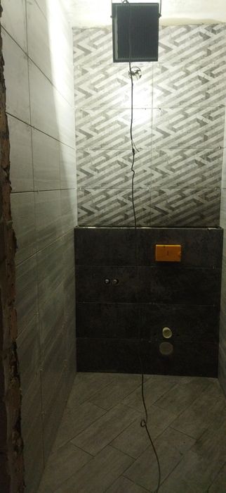Укладка керамічної плитки,ламінат,шпаклівка стін .