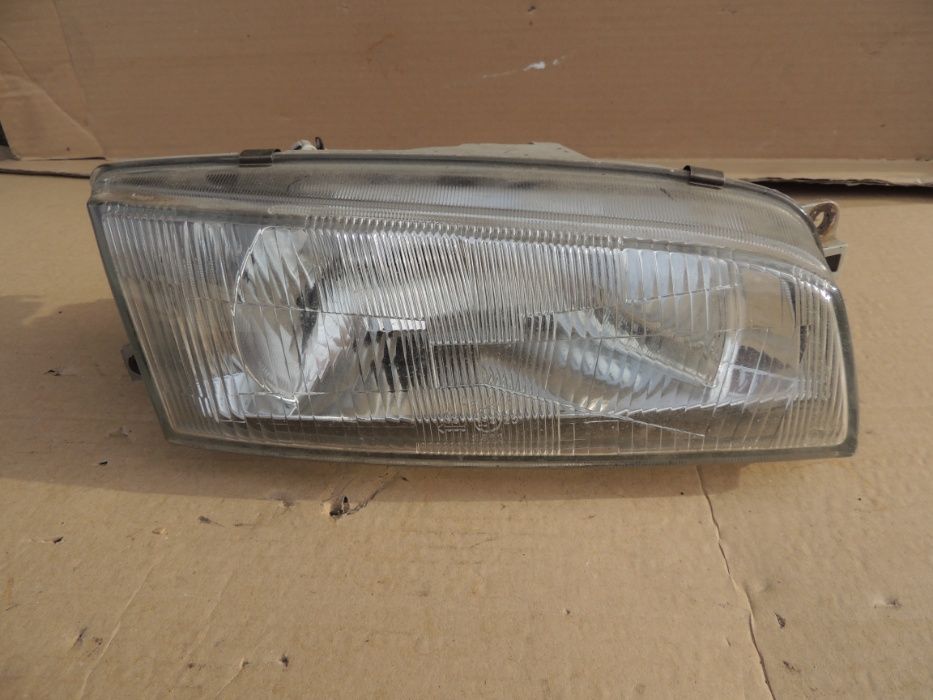 Lampa przednia prawa europejska Mitsubishi Lancer 7 VII 95,96,97,98