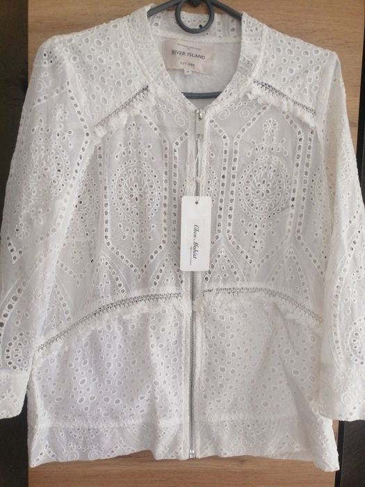 Жіноча легка вітрівка