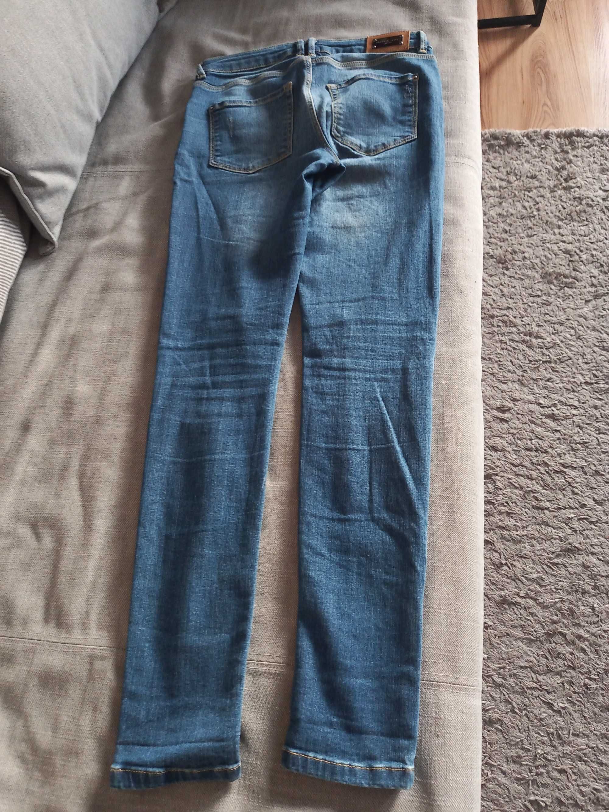 Sprzedam spodnie jeansy rozm. 36 (Orsay)