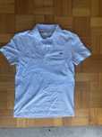 Polo Lacoste azul bebé