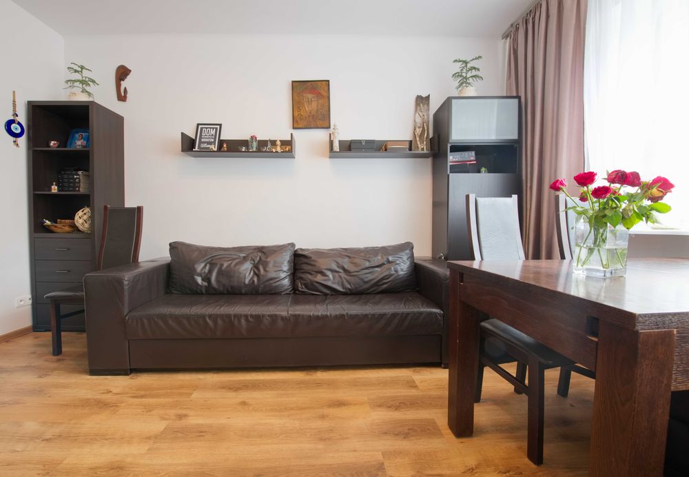 Skórzany wypoczonek wraz z fotelem firmy STANUCH