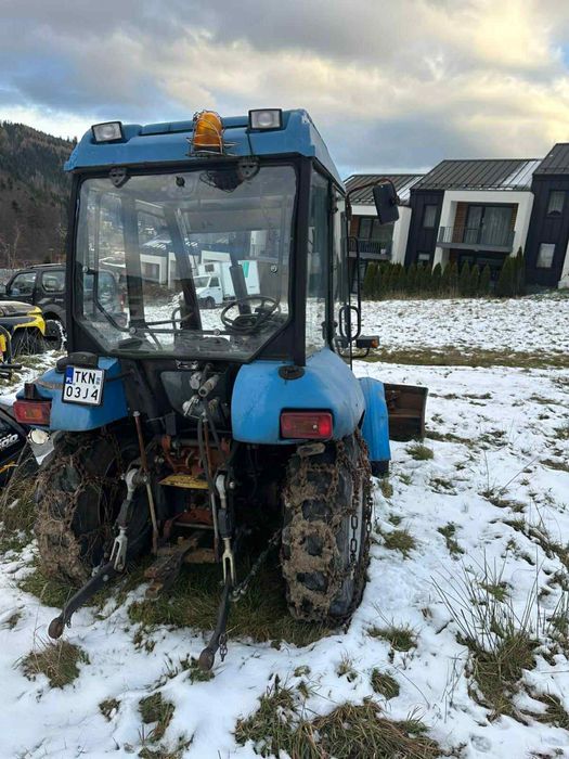 Pronar MTZ 320a 4x4 z pługiem i łańcuchami