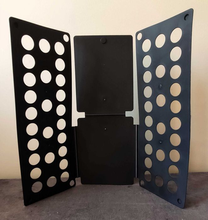 Dobrador roupa crianças