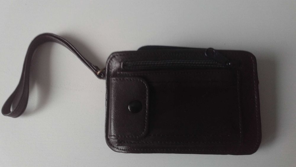 Mała skórzana torebka na dokumenty - męska saszetka