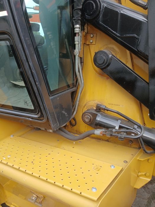Koparko-ładowarka CAT 428D JCB CASE VOLVO