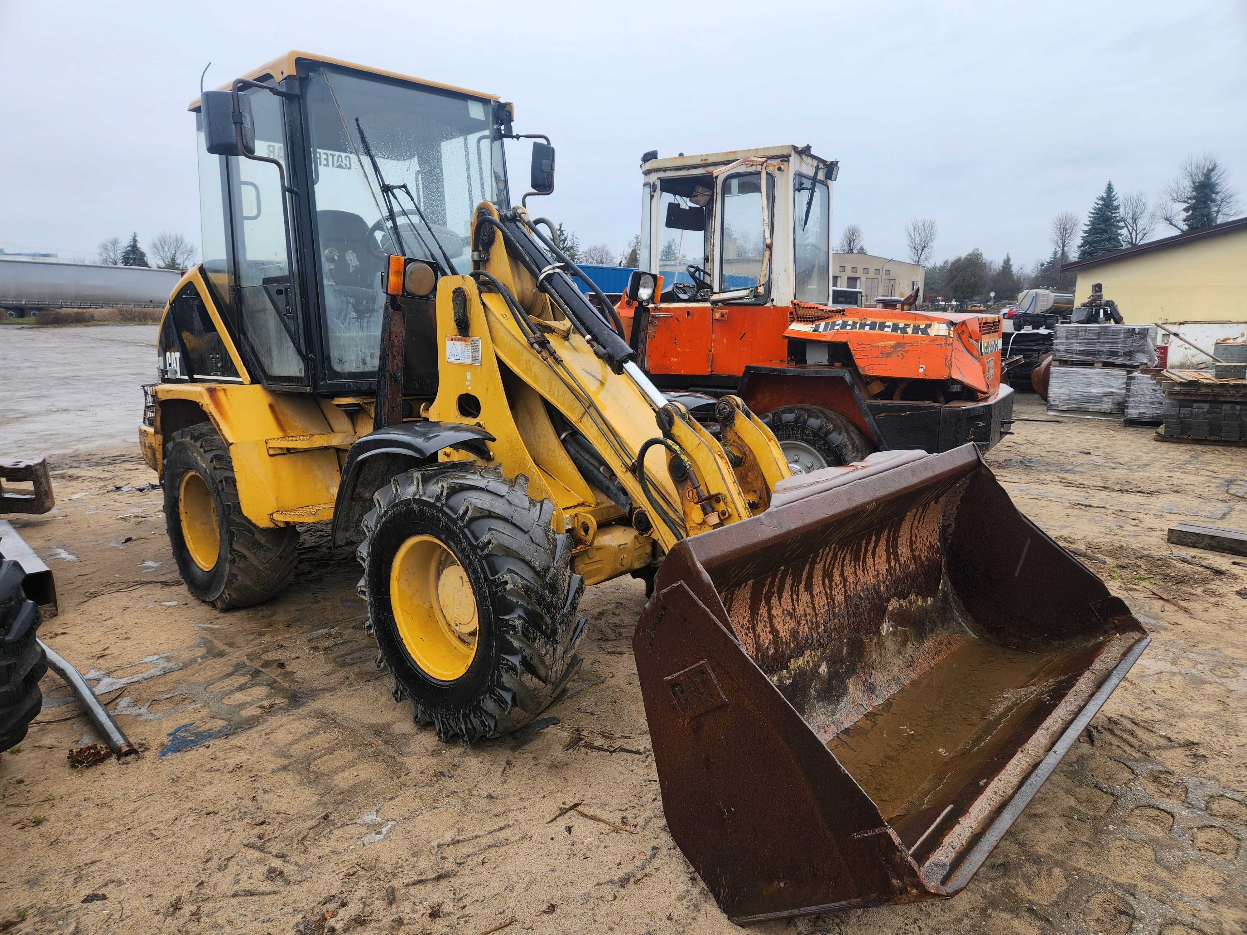 ładowarka kołowa caterpilar 908 kramer jcb atlas liebherr