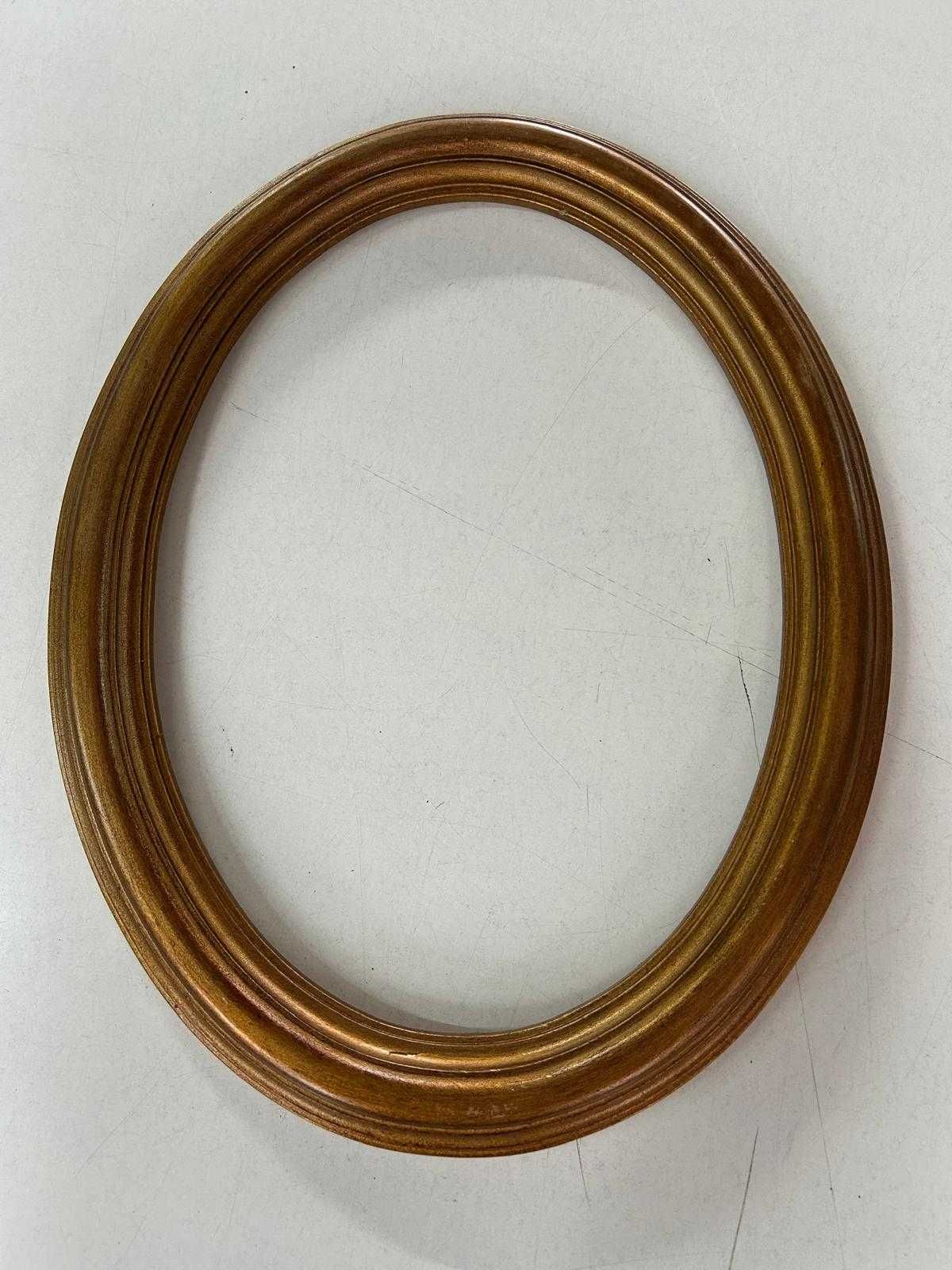 Moldura oval de talha dourada