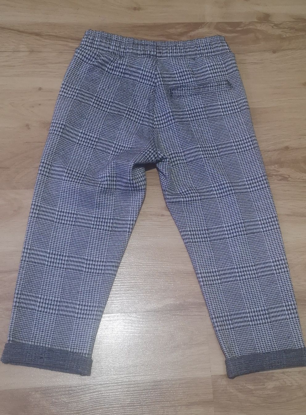 Spodnie materiałowe dla chłopca w kratkę Kappahl roz. 98