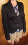 Blazer de mulher preto usado