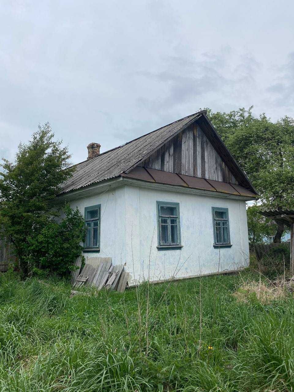 Продаж будинку  із земельною ділянкою.