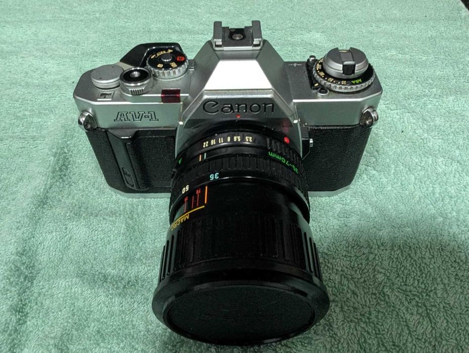 Canon AV-1 + Lente FD + Teleconversor + Filtro UV + Bolsa