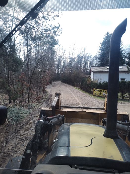 Roboty Ziemne Usługi koparko  ładowarką CAT Pracę Ziemne Odśnieżanie