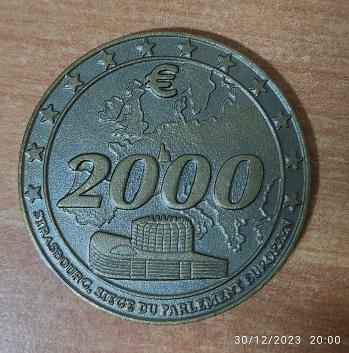 Medalha e moedas de colecção