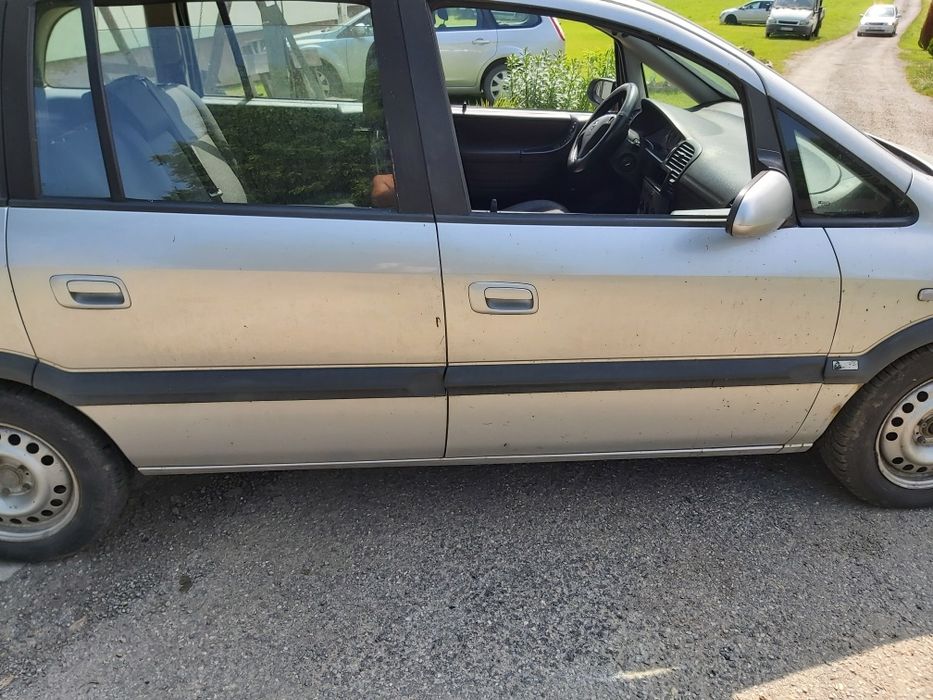 Drzwi lusterka  szyby zamki klamki zafira