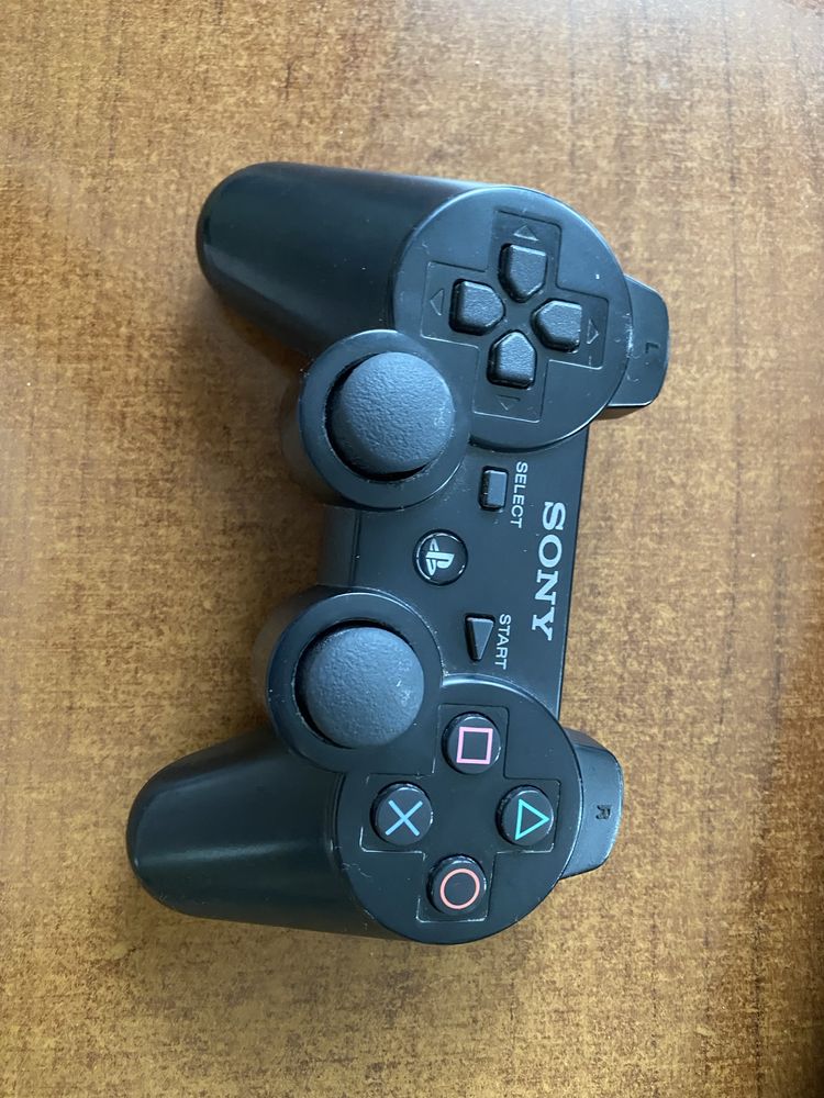 PS 3 + pad+ 8 gier