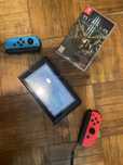 Nintendo Switch Model HAC-001(-01) (v2) + karta pamieci 128gb + gra