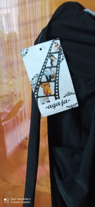 Nowe czarne eleganckie materiałowe spodnie rozm L/ XL