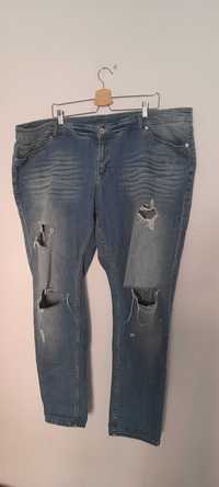 H&M Niebieskie jeansy rurki skinny z dziurami wysoki stan 52