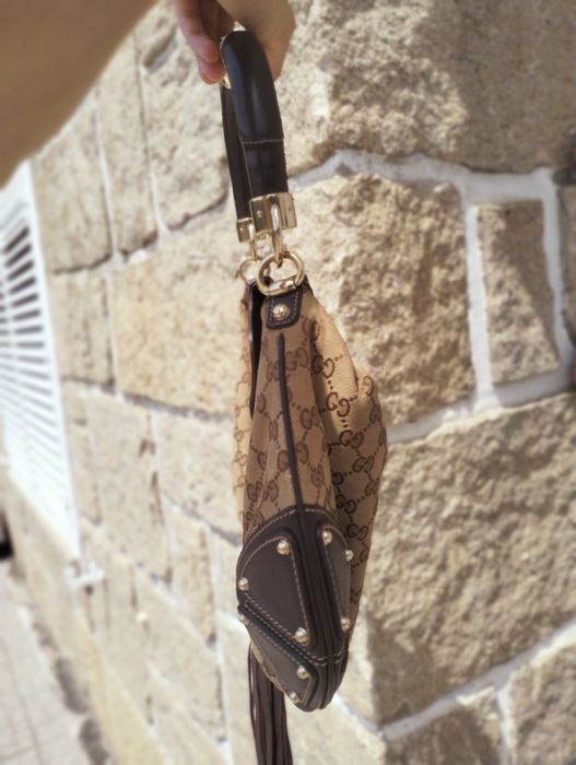 Gucci Bolsa GG Canvas Mini Babouska Indy