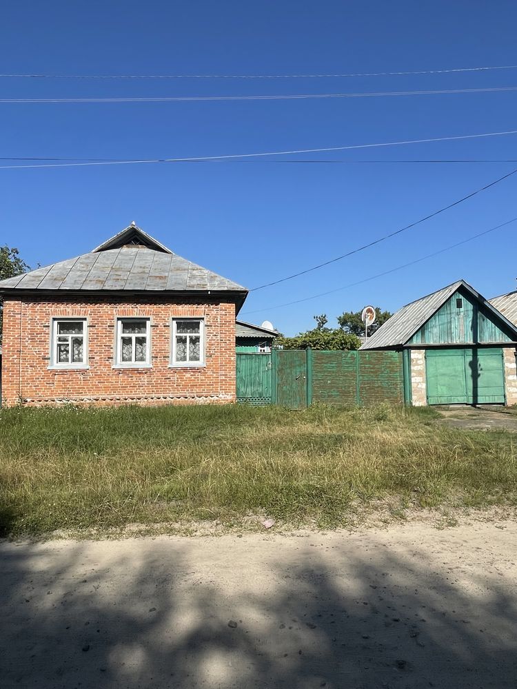 Продам добротний будинок дерев’яний обкладений кирпичем в с. Добрянка