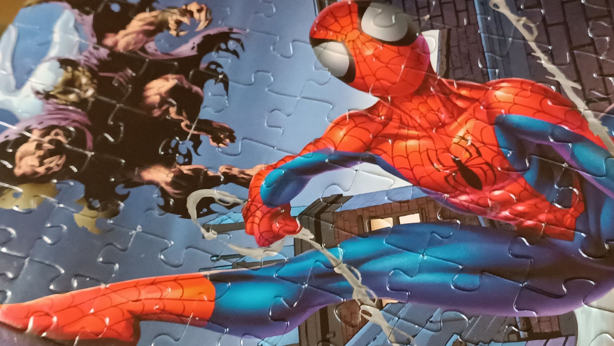 2 puzzles antigos do homem aranha