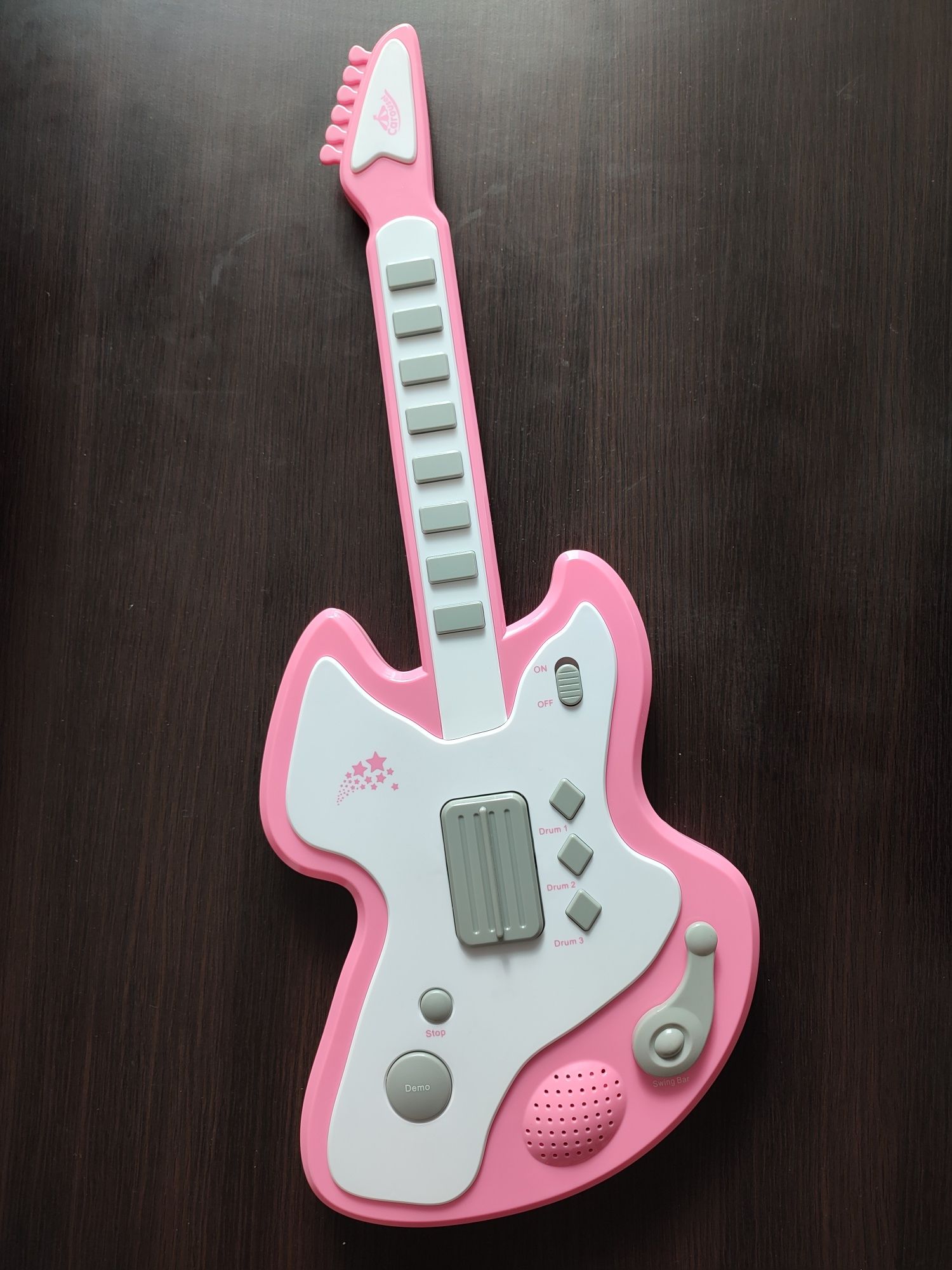 gitara grająca (58 cm) dla dziecka bez śladów użytkowania, na baterie