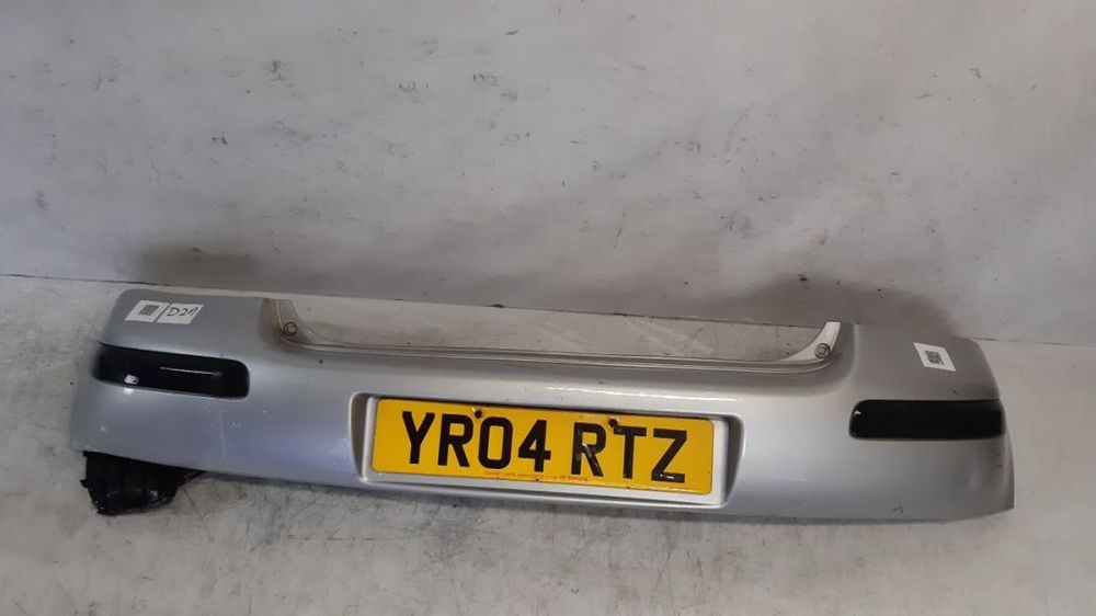 * ZDERZAK TYŁ TYLNY DO TOYOTA YARIS I 1 HB 199 SREBRNY