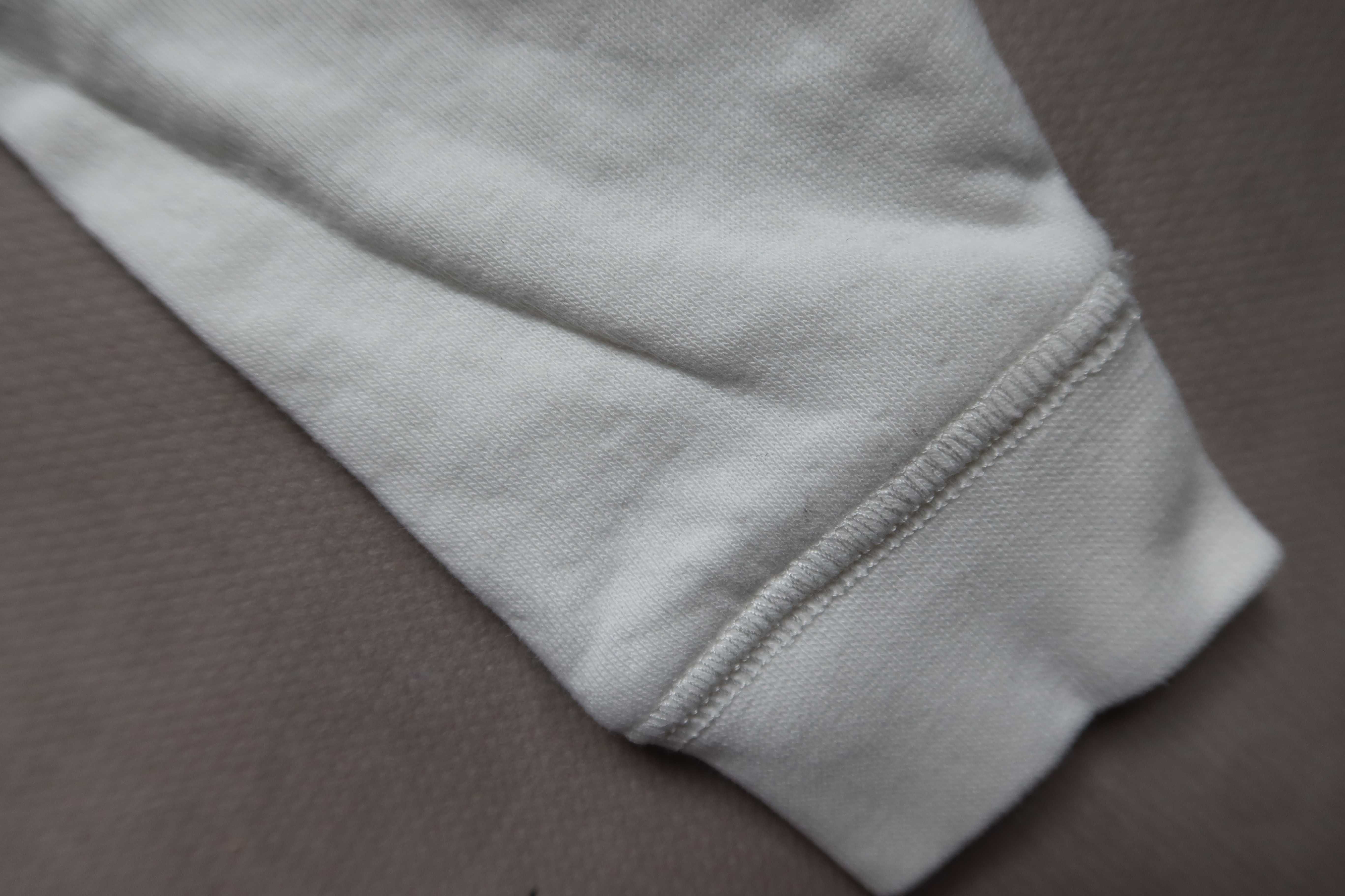 Spodnie 50 NEWBIE białe wyprawka wcześniak noworodek