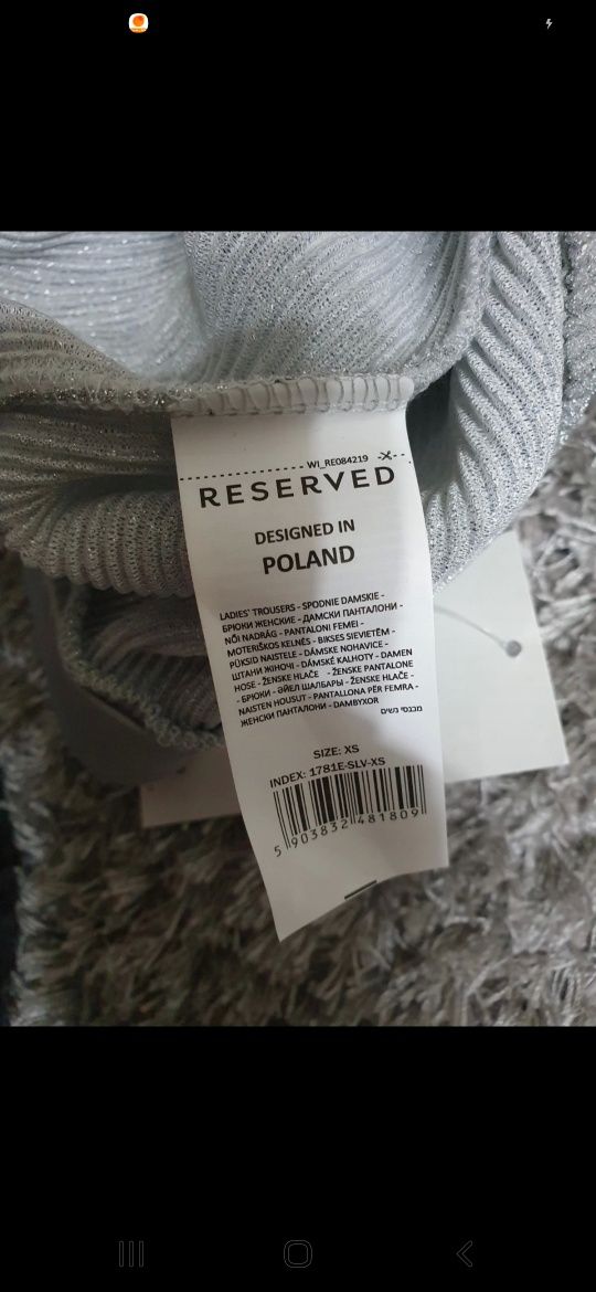 Nowe spodnie Reserved srebrna nitka plisowane
