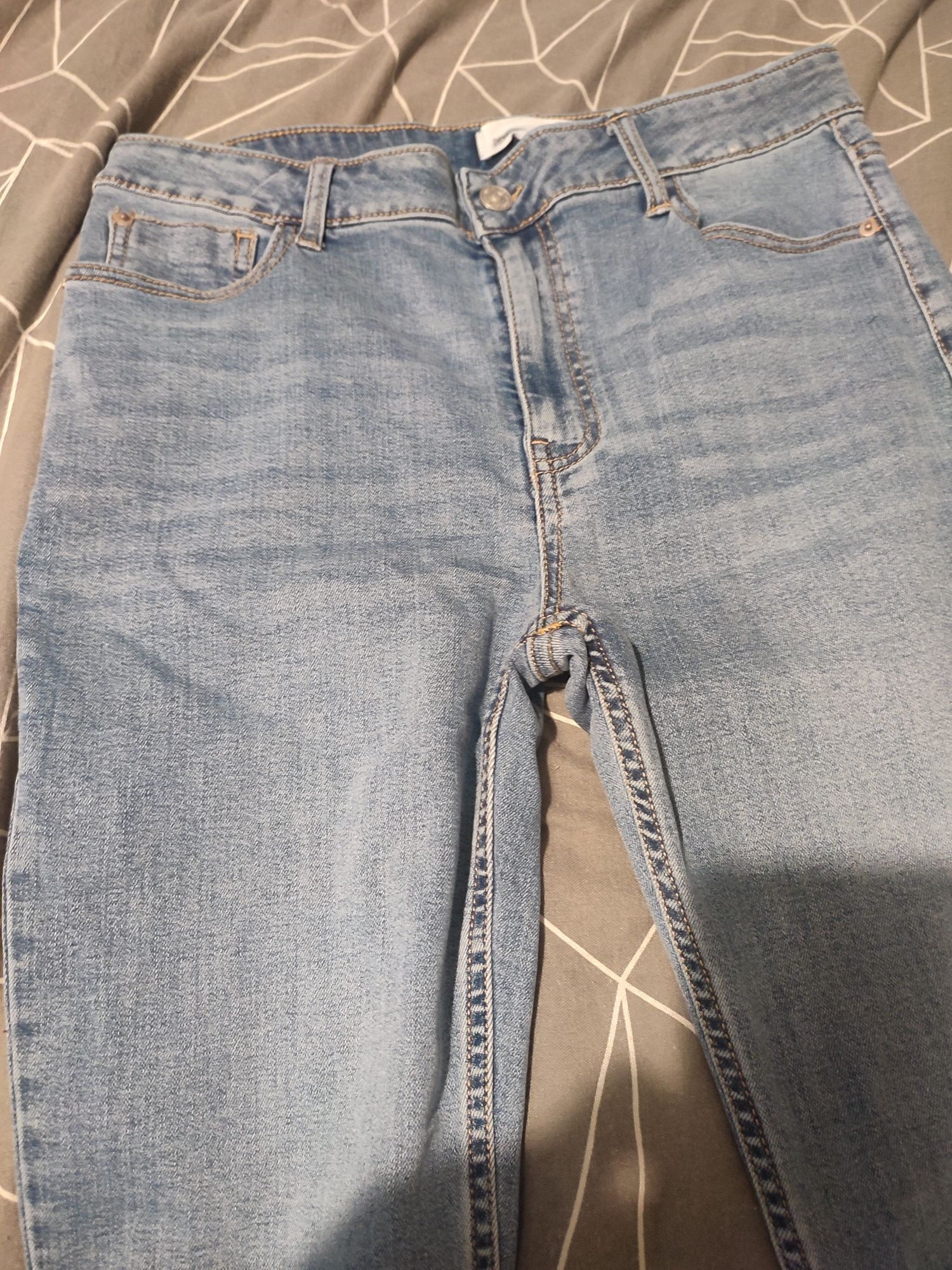 Nowe spodnie jeansowe skiny mid waist rozmiar 38 Sinsay