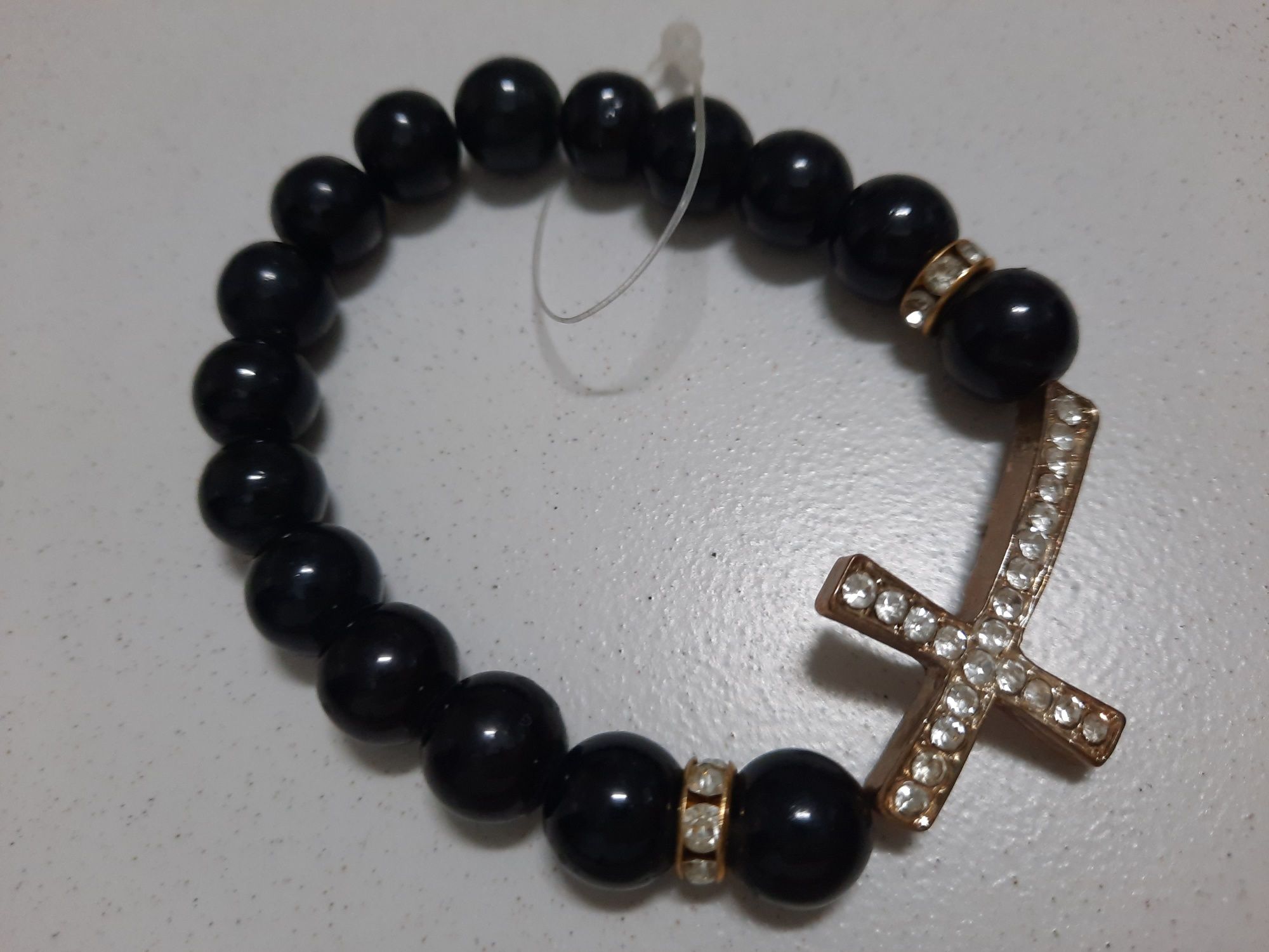 Pulseira com cruz. Nova