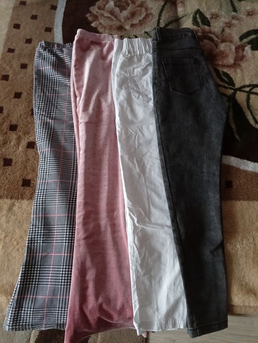 Spodnie dla dziewczynki r.140/146 - 4 szt.