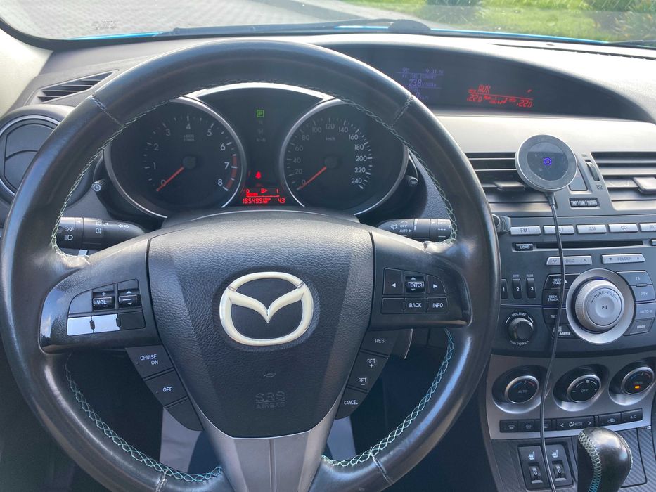 Mazda 3 (автомобіль Ольги Фреймут. Запис в сервісній книжці)