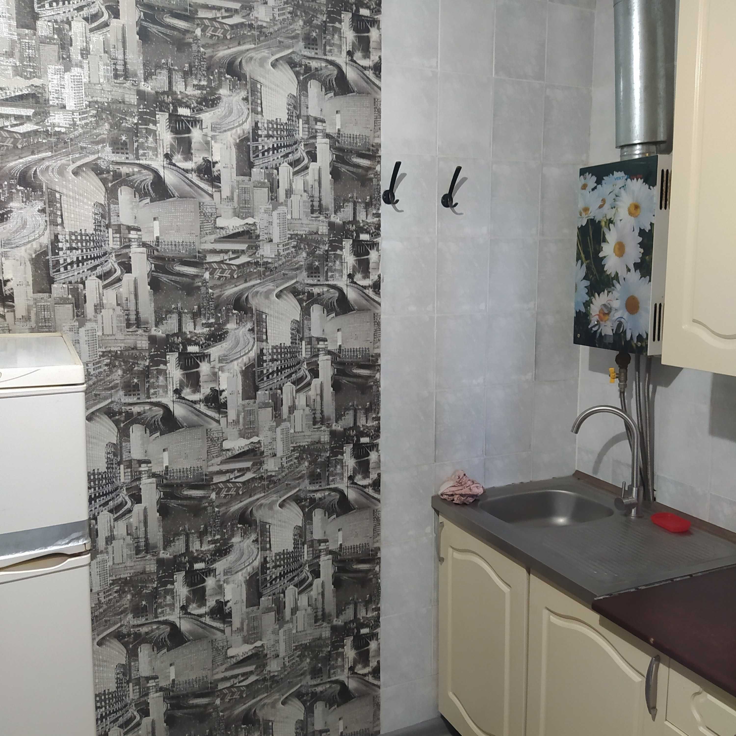 Продам 4-х кімнатну квартиру в центрі з індивідуальним опаленням