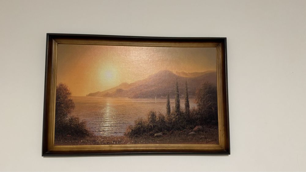 Картина у рамі приблизно 60 на 40 см