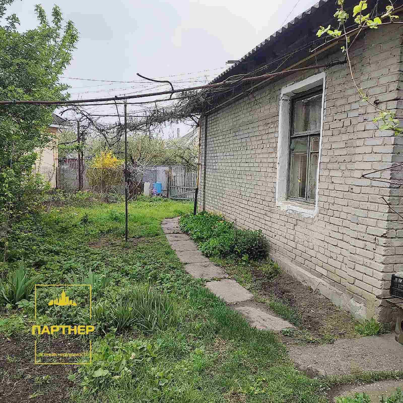 Продам  1\2  частину  будинку   район  пивзаводу  у Кременчуці