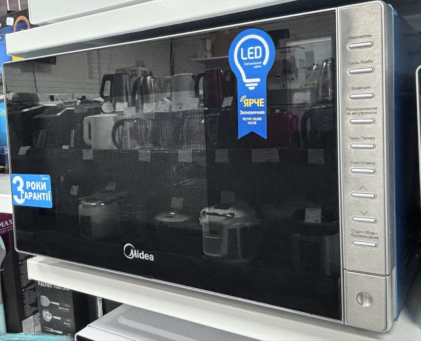 Мікрохвильовка з грилем та конвекцією Midea AW925EXG