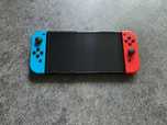 Konsola Nintendo switch oled  Joy con z efektem halla karta sd + grati