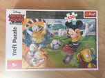 Myszka Miki gra na boisku Kaczor Donald nowe puzzle 100 sztuk Trefl