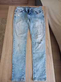 Spodnie jeans damskie