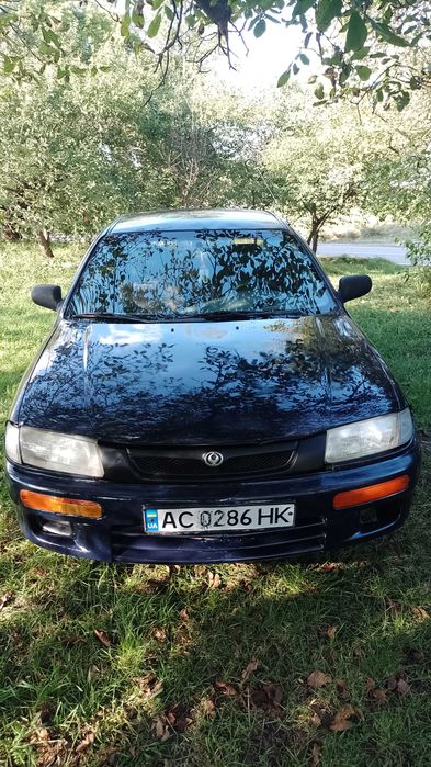 Авто Mazda 323 1996