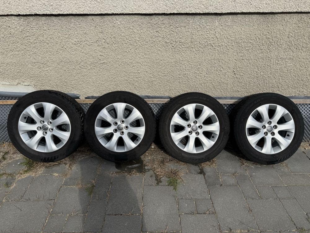 Oryginalne felgi 5x105 16 cali Opel Astra J z oponami zimowymi 205/60