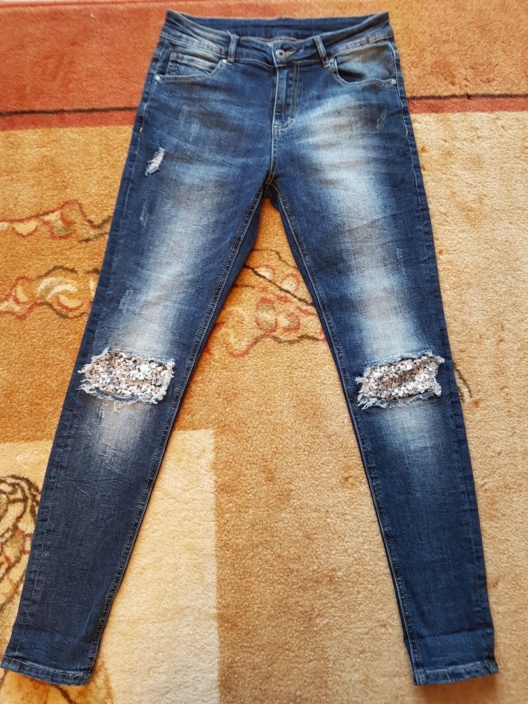 Jeansy z prztarciami roz S- M