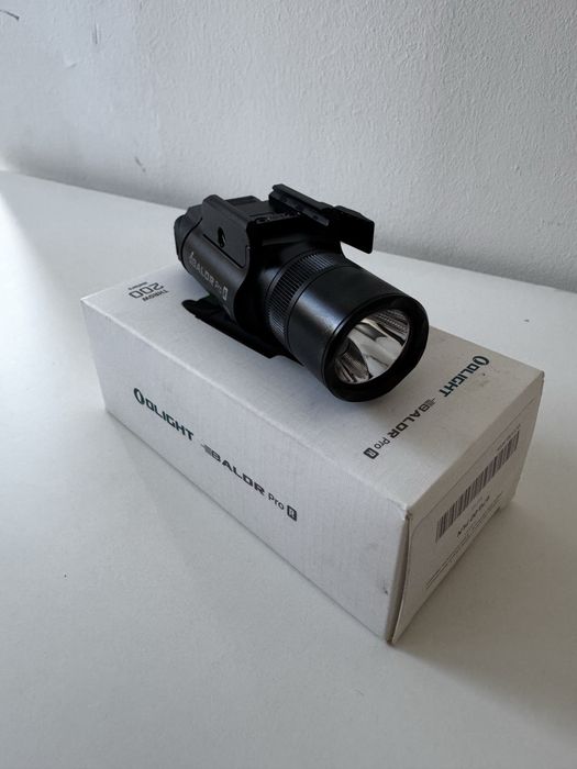 Olight BALDR Pro R - Latarka z celownikiem laserowym - Jak nowa!